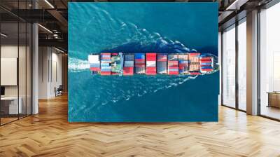 Aerial view of cargo ship with contrail in the ocean sea ship carrying container and running from container international port smart freight shipping by ship service Wall mural