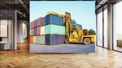 container with forklift loading. Wall mural