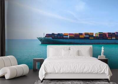 Side Ship view of Cargo Container Ship with Tug boat carrying container and running very fast for export cargo from container yard port to custom ,Contrail line in the ocean Wall mural