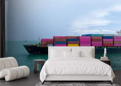 Side view Cargo container ship carrying container and running in the ocean near international container port customs shipyard sea port concept smart logistic service. transportation logistics trading Wall mural