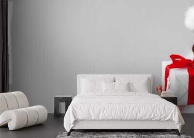 Girl with christmas gift box Wall mural