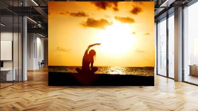 sunset yoga woman Wall mural