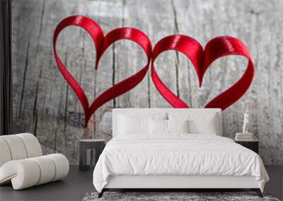 Two ribbon hearts on wood Wall mural