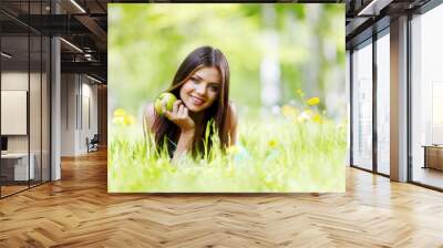 Woman on flower field Wall mural