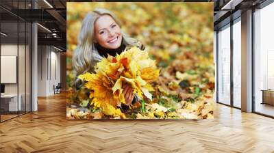 woman portret in autumn leaf Wall mural