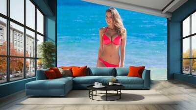 Young woman in red bikini Wall mural