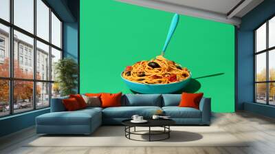 Pasta puttanesca dish, minimalist on a green background Wall mural