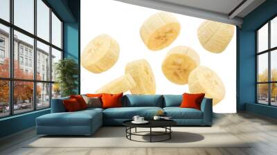 Flying banana slices, isolated on white background Wall mural