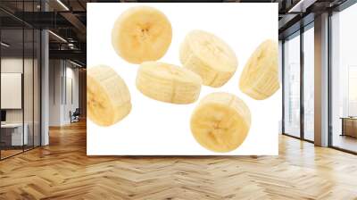 Flying delicious banana slices, isolated on white background Wall mural