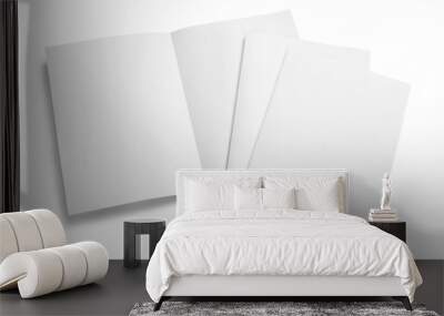 Folded sheets of white paper, isolated on white background Wall mural