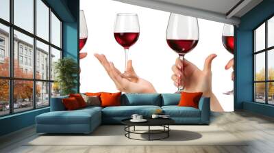 Set of elegant female hands holding glasses of red wine, cut out Wall mural