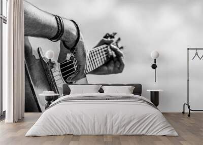 Acoustic guitars playing. Music concept. Black and white. Male musician playing guitar, music instrument. Man's hands playing acoustic guitar, close up Wall mural