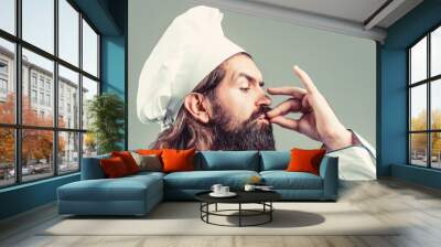 Bearded chef, cooks or baker. Bearded male chefs isolated on white, perfect. Professional chef man showing sign for delicious. Chef, cook making tasty delicious gesture by kissing fingers. Cook hat Wall mural