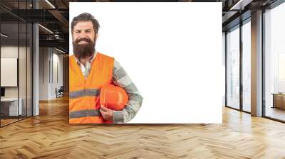 Bearded man worker in building helmet or hard hat. Portrait of a builder smiling. Worker in construction uniform. Man builders, industry Wall mural