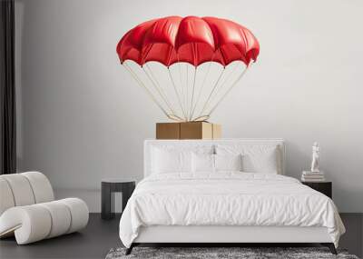 cardboard package with red parachute on white background Wall mural