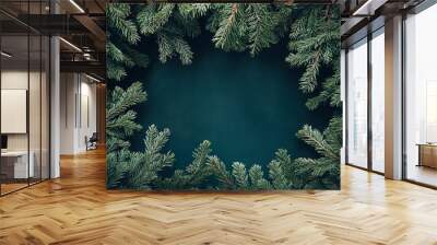 Overhead perspective of spruce and thuja branches against a festive christmas backdrop Wall mural