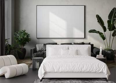 Stylish room showcases black sofa with large blank canvas above it Wall mural