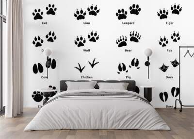 Animals footprints, paw prints. Set of different animals and birds footprints and traces. Cat, lion, tiger, bear, dog, cow, pig, chicken, elephant, horse etc Wall mural