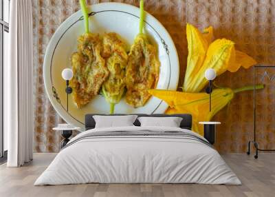 Pumpkin and zucchini flowers fried in batter. Edible flowers concept Wall mural