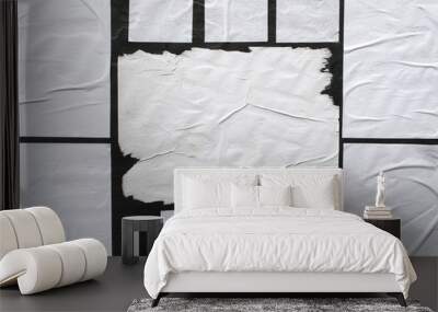 Several sheets of white paper pasted on a black wall. Wall mural