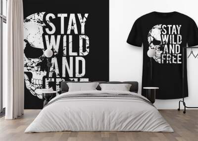 T-shirt design with skull and slogan. Vintage typography for tee print with slogan stay wild and free. Skull with grunge texture in vintage and hipster style Wall mural