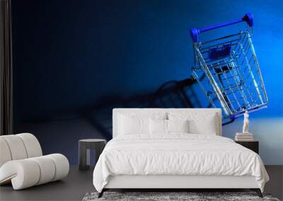 Shopping Cart on a blue background Wall mural