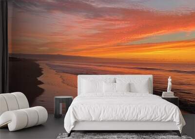 Serene Sunset on Hatteras Beach, North Carolina: Tranquil Ocean Waves and Warm Orange-Pink Sky Creating an Enchanting Evening Ambiance Wall mural