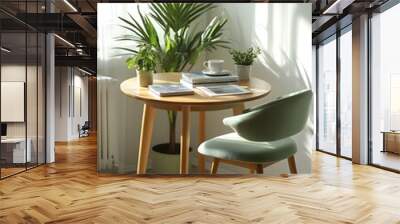 Round Wooden Table with Books, Plants, and Green Chair in Bright Dining Room Wall mural