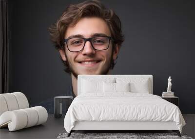 Smiling Young Man in Glasses, Studio Portrait Wall mural