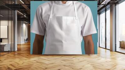 Chef in Pristine White Uniform Against a Blue Background Wall mural