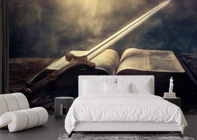 open Holy Bible book with spirit sword on top with epic clouds and smoke, on dark background for overlay. concept of God protection Wall mural