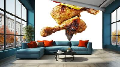 Grilled chicken drumsticks with pepper on vintage fork isolated on white Wall mural