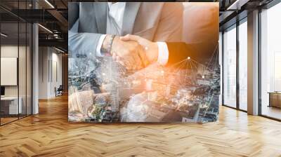 Double exposure worker hand shake teamwork brainstorming with innovation business. concept success investment.Business People Handshake Greeting Deal Concept. Wall mural