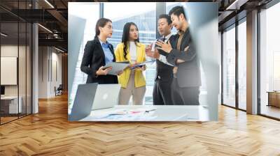 Group of young asian creative business brain storm meeting presentation,discussing roadmap to product launch, planning,strategy,new business development,working with new startup project in office. Wall mural