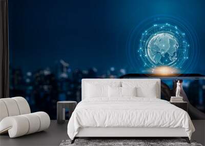 Modern city with wireless network connection and city scape concept.Wireless network and Connection technology concept with city background at night. Wall mural