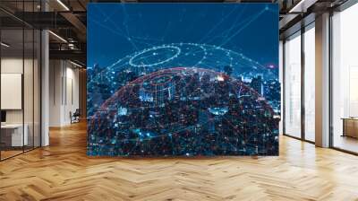 Modern city with wireless network connection and city scape concept.Wireless network and Connection technology concept with city background at night. Wall mural