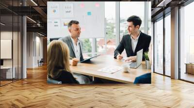 Muslim woman speaks in office.Business, startup, presentation, strategy and people concept - men making presentation to creative team at office. Wall mural