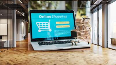 Online shopping and iot(internet of things) concept.Boxes in a trolley on a laptop. Ideas for online shopping,online shopping is consumers to directly buy goods from a seller over the internet. Wall mural