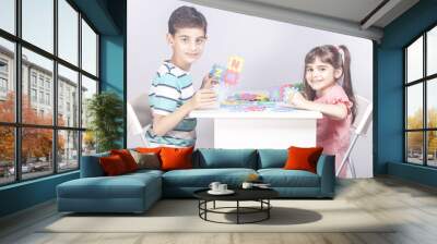 Kids playing together and having fun Wall mural