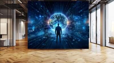 A lone figure stands before a glowing, digital earth surrounded by lines and lights. Wall mural