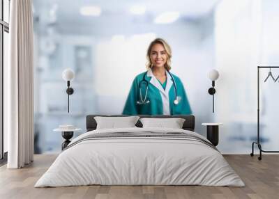 A woman in a teal medical scrub with a white lab coat smiles while wearing a stethoscope in a bright, sterile room. Wall mural