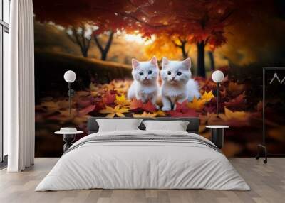 Two white kittens with blue eyes sit amongst autumn leaves. Wall mural