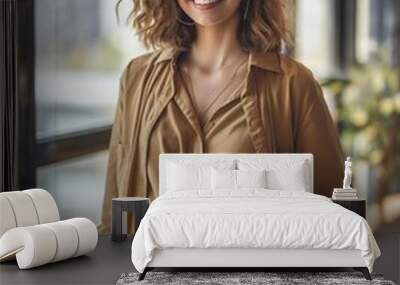 Portrait of a beautiful young smiling businesswoman standing at a modern office interior, with sunlight coming through the window. generative AI Wall mural