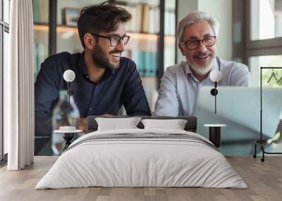 Portrait of smiling hispanic young businessman working with middle aged business man at office meeting, sitting in modern boardroom and discussing project using laptop computer. generative AI Wall mural