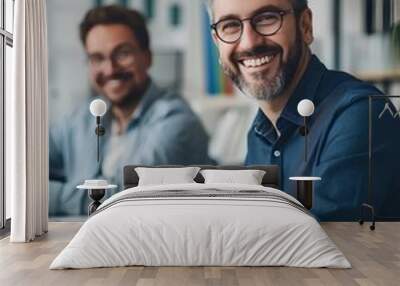 young smiling business CEO sitting at desk with laptop and senior male together looking happy while working on financial data, meeting in modern office. generative AI Wall mural