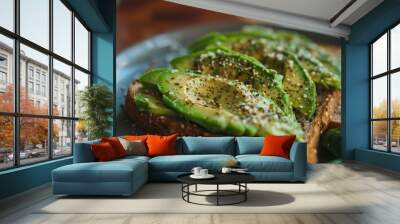 Closeup of avocado slices on multigrain bread, sprinkled with spices Wall mural