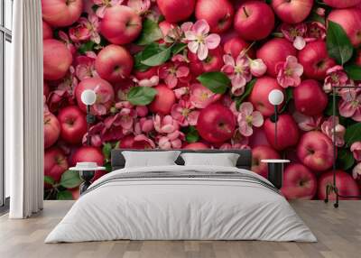 Top view of red apples mixed with pink apple blossoms, ideal for spring concepts Wall mural