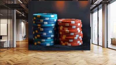 Two stacks of poker chips, one red and one blue, standing on a black felt surface, suggesting a game is about to begin Wall mural