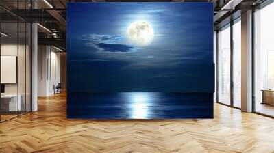 Super full moon and cloud in the blue sky above the ocean horizon at midnight, moonlight reflect the water surface and wave, Beautiful nature landscape view at night scene of the sea for background Wall mural