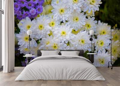 Bouquet of yellow flowers, white, purple flowers blossoming toge Wall mural